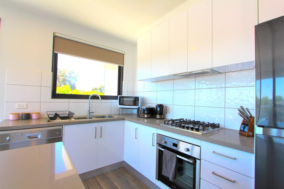 Apartment | Private kitchen | Full-size fridge, microwave, oven, stovetop