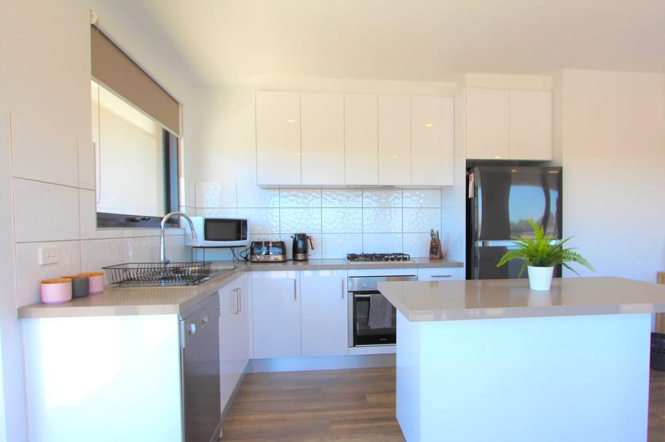Apartment | Private kitchen | Full-size fridge, microwave, oven, stovetop
