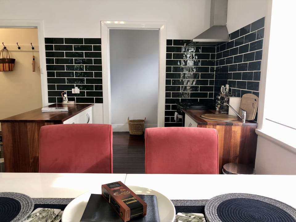 Kitchen and dining with Butlers pantry in the background