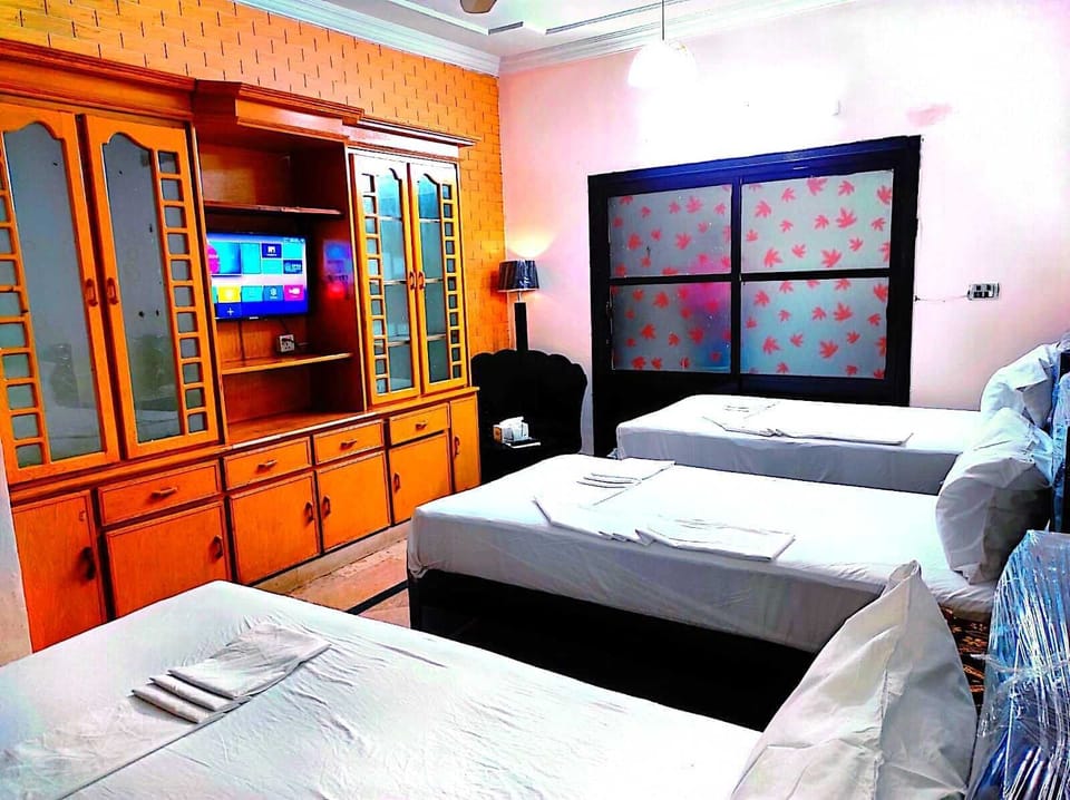 Executive Triple Room | Premium bedding, Select Comfort beds, individually decorated, desk