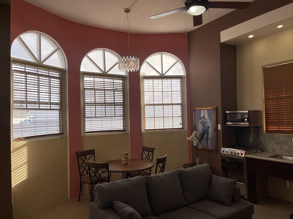 Deluxe Single Room | Living area | 32-inch flat-screen TV with digital channels, TV, toys