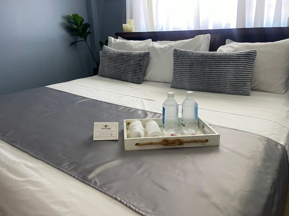 Deluxe Single Room | Blackout drapes, iron/ironing board (on request), WiFi (free)
