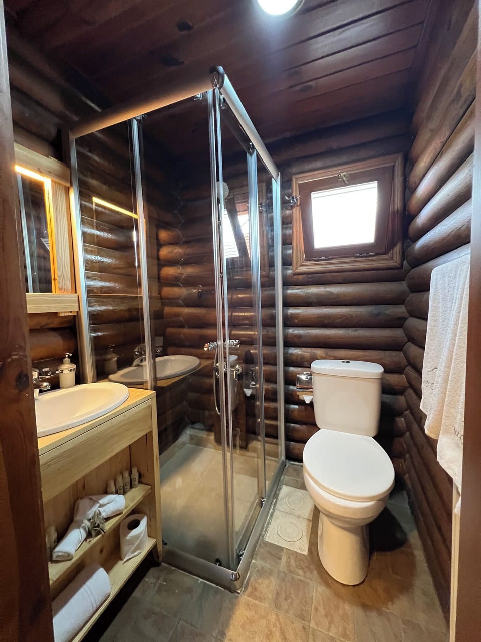 Shower, slippers, towels, soap