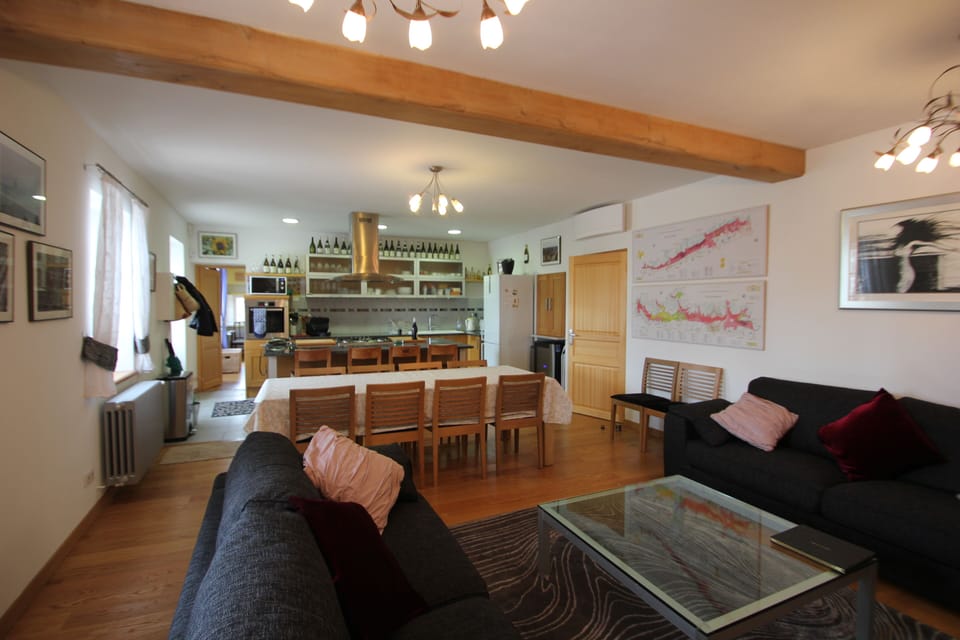 The living area is spacious, light and cosy at the same time