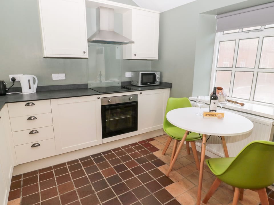 Fridge, dishwasher, electric kettle, cookware/dishes/utensils
