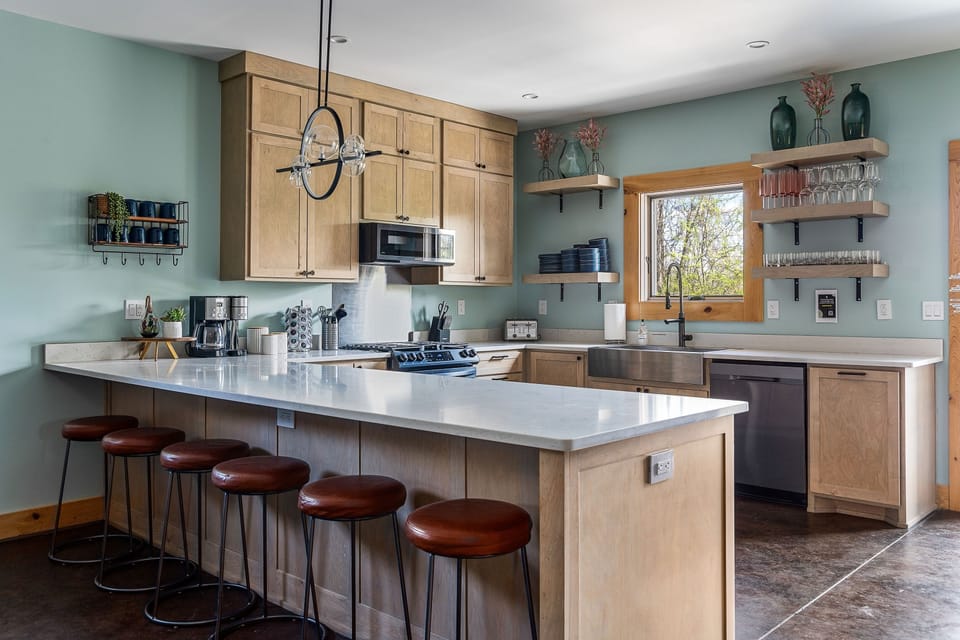 You will have plenty of room to pull up to the bar for a snack, coffee, or to chat with your group's chef (whoever that may be!)