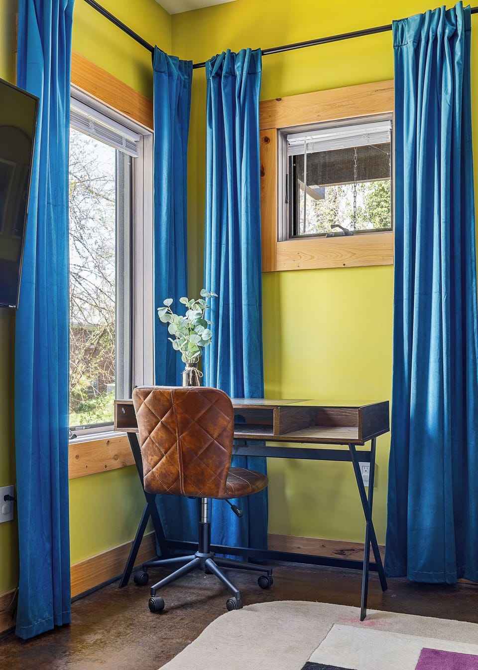 With natural lighting and cozy decor, this work station is perfect for productivity or relaxation.