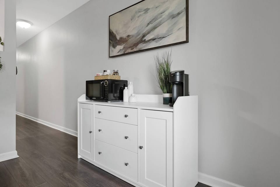 There is a microwave ready for heating up delicious meals and a coffee maker to help your prepare that perfect caffeine drink that will give you that needed energy early in the morning!
