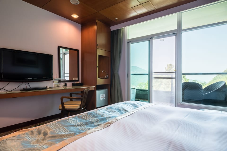 Deluxe Double Room | Down comforters, blackout drapes, free WiFi, bed sheets