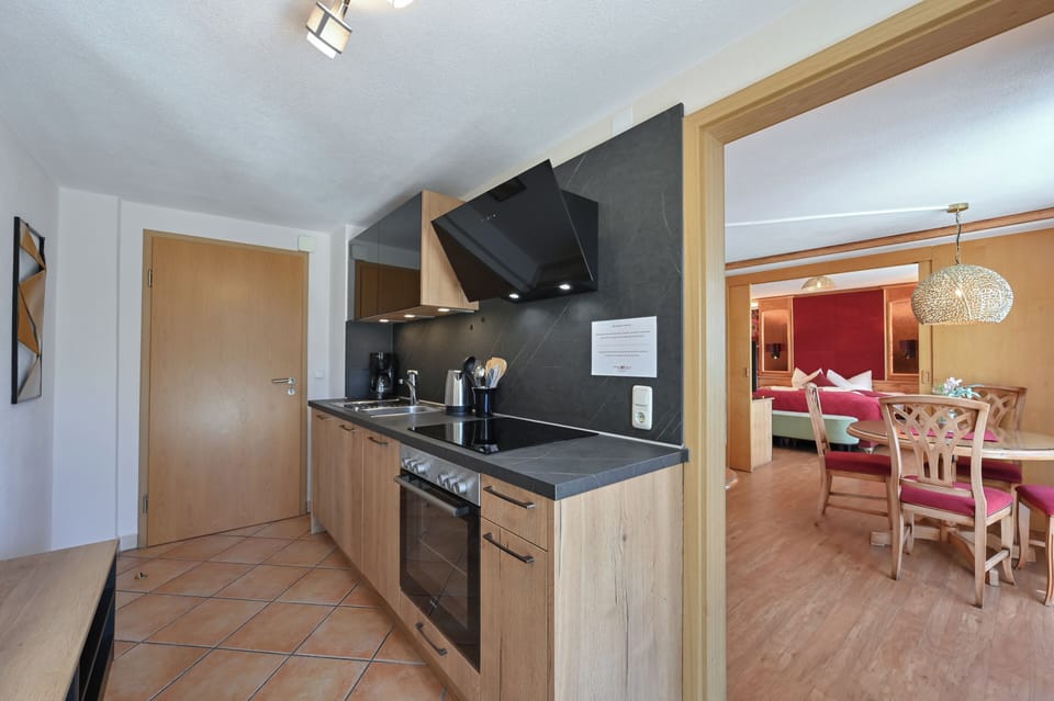 Grand Condo, 1 Queen Bed with Sofa bed (large) | Private kitchen | Full-size fridge, dishwasher, cleaning supplies
