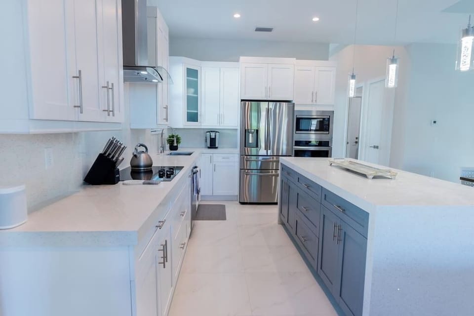 This spacious, designer kitchen with all new appliances, is well-equipped kitchen to make dining in a breeze.