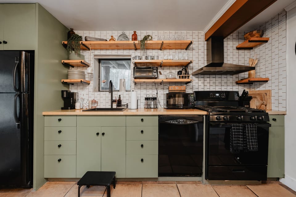 Fully stocked with all your cooking needs, this farmhouse style kitchen will be the perfect spot to prepare wonderful home cooked dinners for friends and family. 