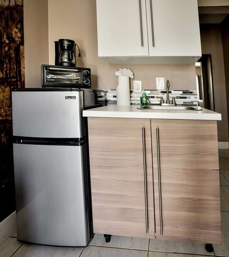 Refrigerator, toaster and coffee maker.