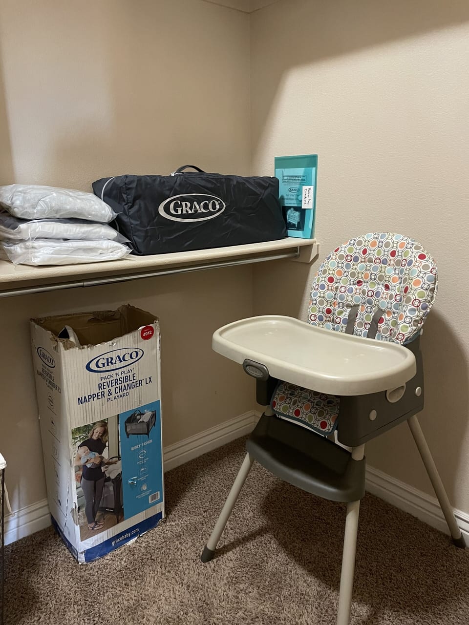 Pack-n-play, bedding, accessories and a highchair.  Found in Master closet