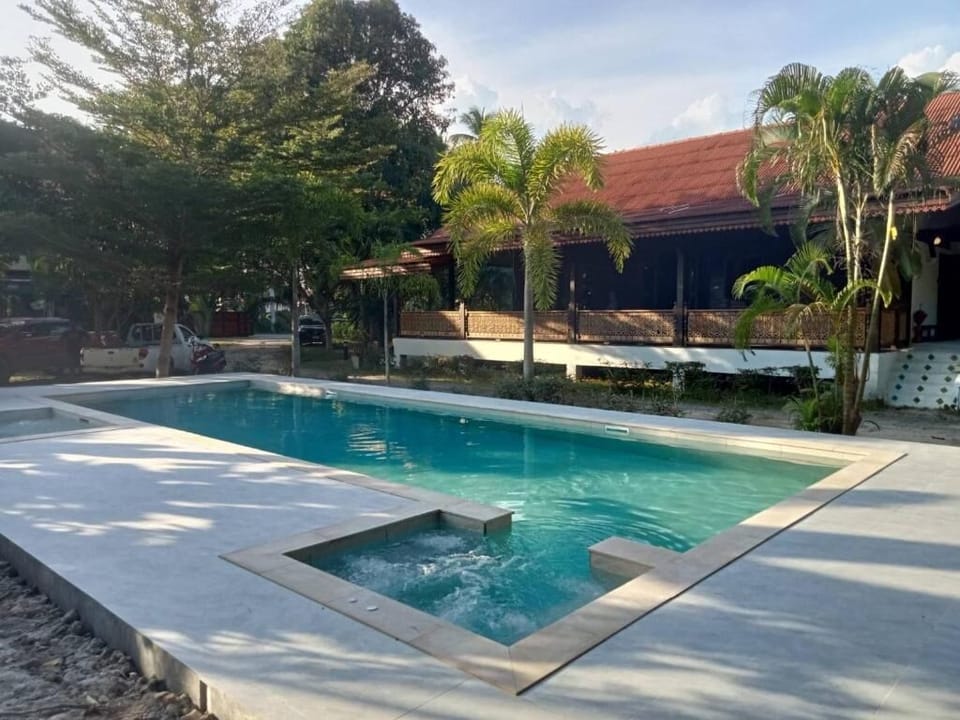 12x4 lap swimming pool plus Jacuzzi and kids pool. 