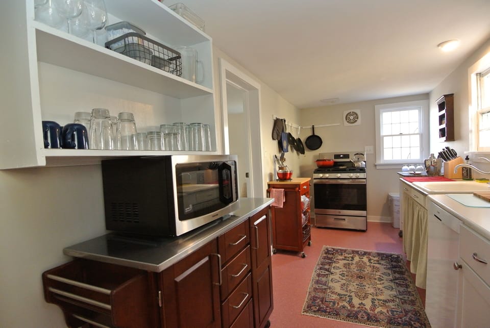 Gas range, refrigerator, microwave, dishwasher, ice machine, coffee and toaster.