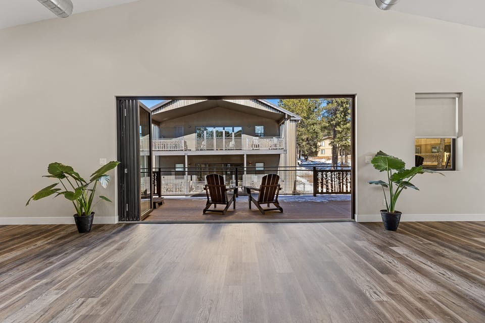 View through push back doors across the courtyard to Aspen Ridge retreat (separate rental)