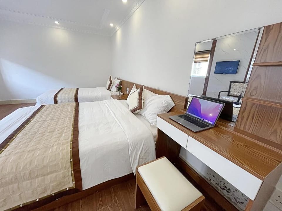 Deluxe Triple Room | Pillowtop beds, free minibar items, iron/ironing board, free WiFi