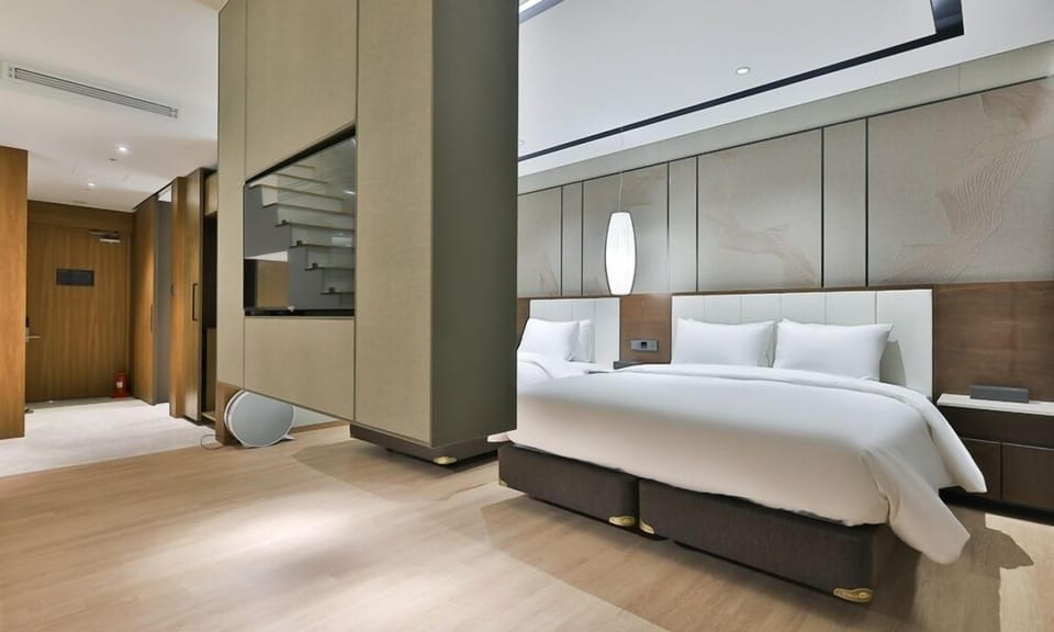 Suite Twin Rooftop | Down comforters, WiFi (free), individually decorated