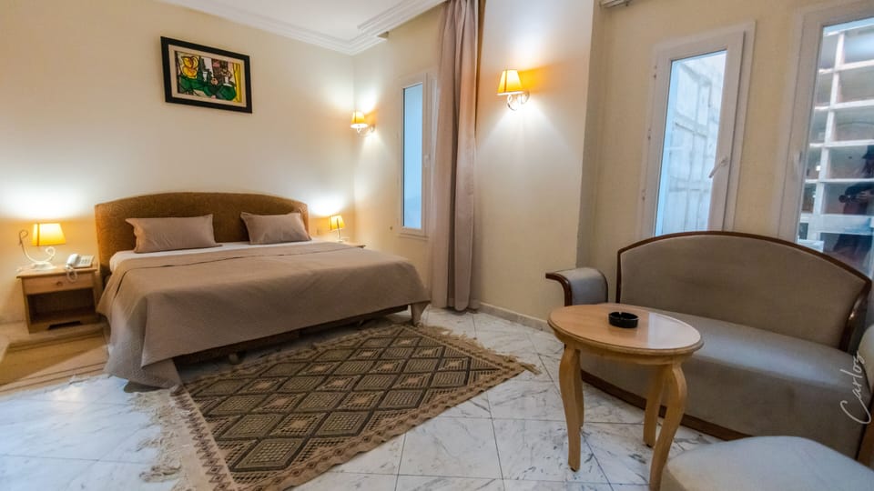 Double or Twin Room | Minibar, in-room safe, blackout drapes, soundproofing