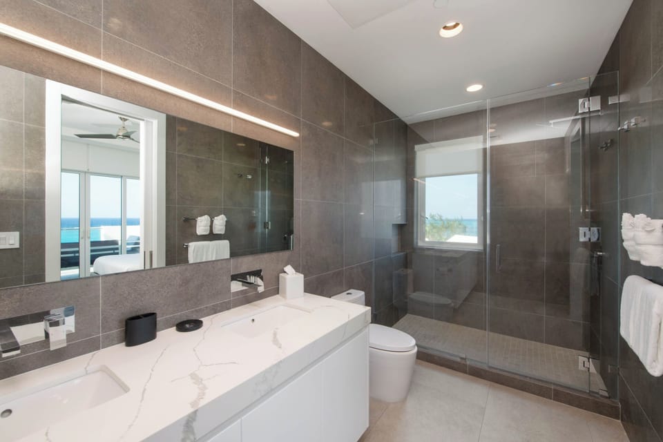 Primary Suite 2 ensuite bathroom with walk-in shower.
