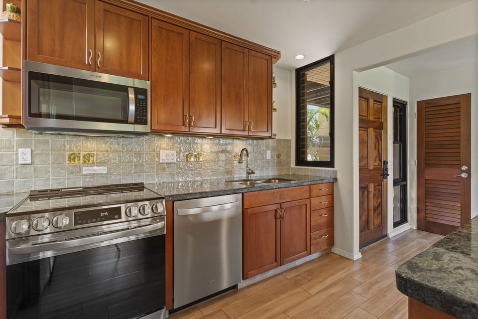 Well equipped & updated kitchen including full sized appliances