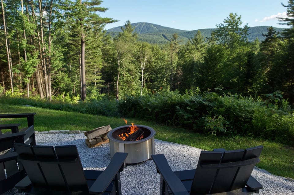 Cool mountain breeze whispers through the trees as you sit by the fire.