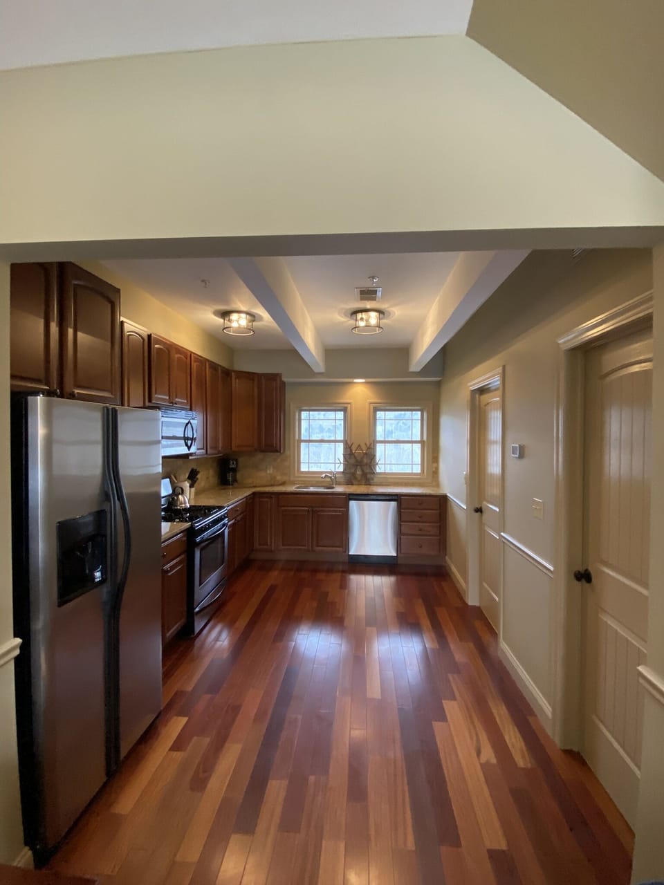 Fully Equipped Kitchen w granite countertops and stainless steel appliances 