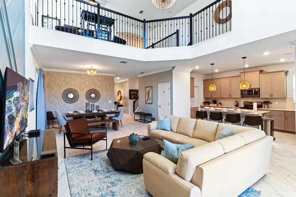 Exquisite Living Area of the Townhouse in Davenport Florida - Large seating capacity, perfect for groups, family and friends - Smart TV and Netflix - High Ceiling for spacious feel
