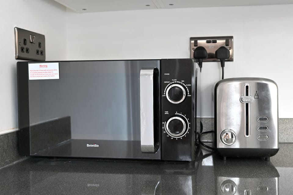 Microwave and toaster. 