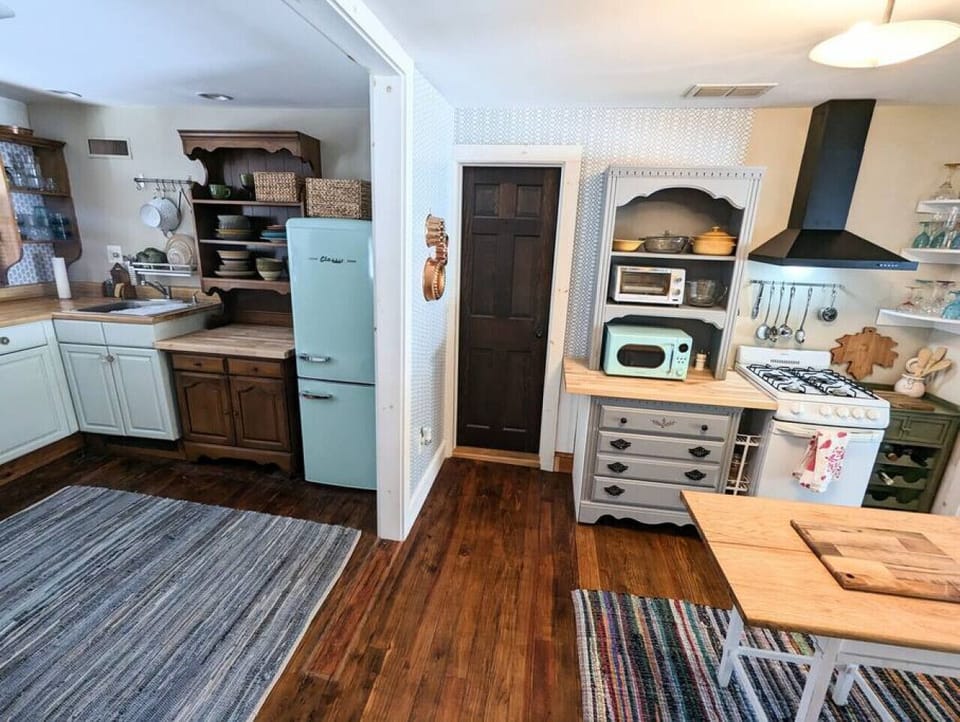The cutest cottage kitchen!  We love to cook, eat and drink,  and so this is set up for you to do that, too!