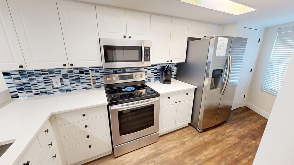 Condo, 2 Bedrooms | Private kitchen | Fridge, coffee/tea maker, toaster