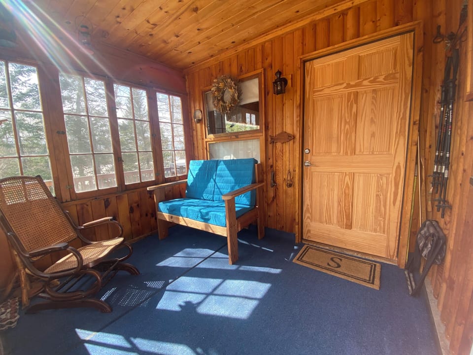 Front porch as you enter.