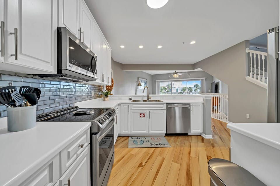 2nd Floor Kitchen Open to Living Room and Balcony