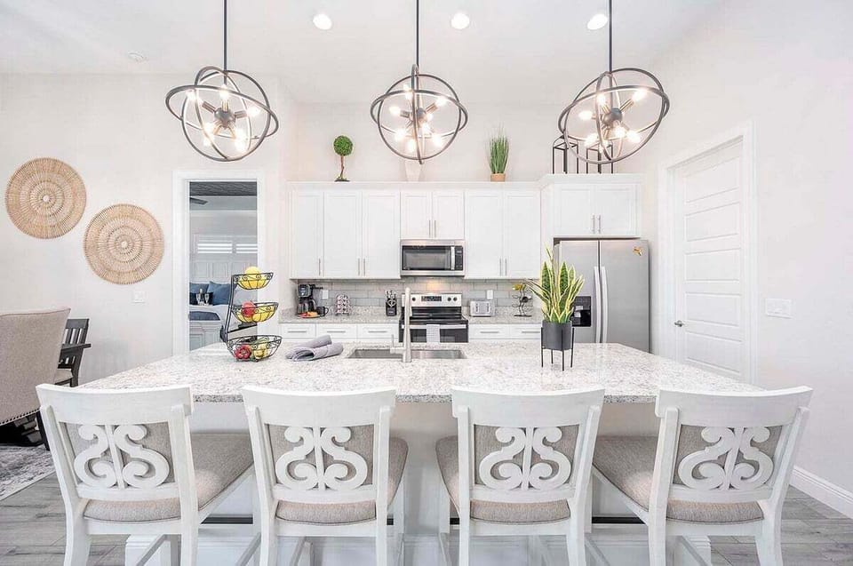Open Kitchen with Stainless Appliances and Large Kitchen Island