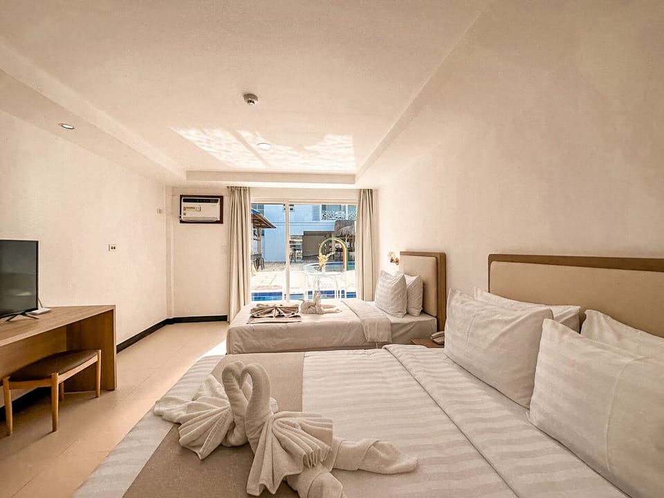In-room safe, laptop workspace, WiFi (free), bed sheets