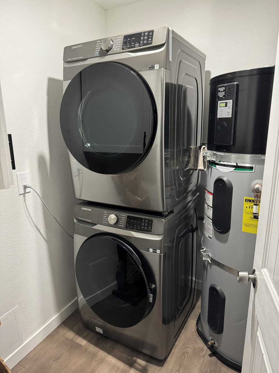 Brand new stackable washer and dryer have been installed.