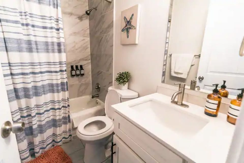 downstairs full bathroom. Located next to dining room
