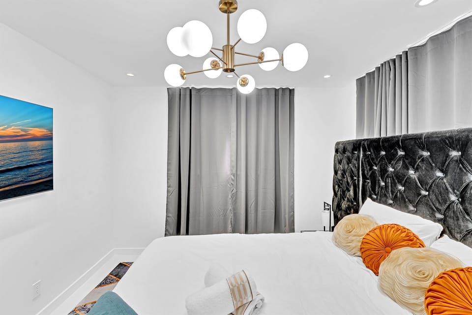 Relaxing bedroom with oceanfront balcony for a peaceful retreat.