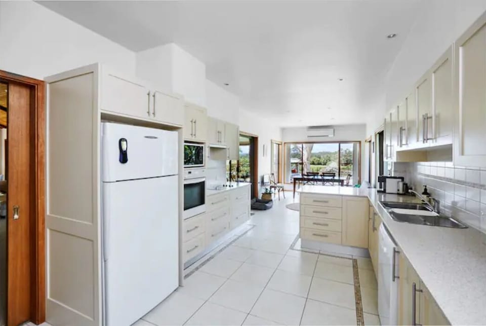 A large, fully equipped kitchen with everything you need to entertain.