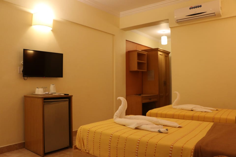 Deluxe Twin Room, 2 Twin Beds, Non Smoking, Pool View | Minibar, in-room safe, desk, blackout drapes
