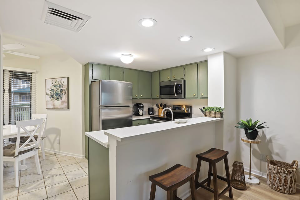 Kitchen connects to breakfast nook.