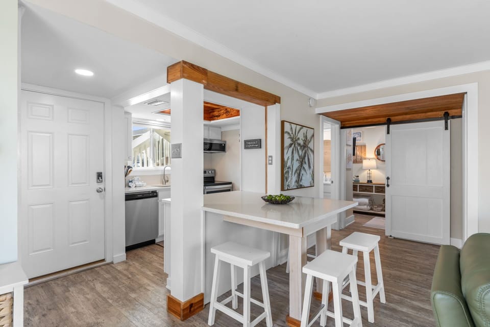 Step into your bright, open-concept retreat where rustic wood accents meet modern farmhouse charm. Gather around the sleek kitchen island with friends or prep meals while dreaming up your next adventure.