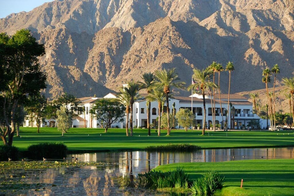 The house is located on the gated grounds of La Quinta Country Club