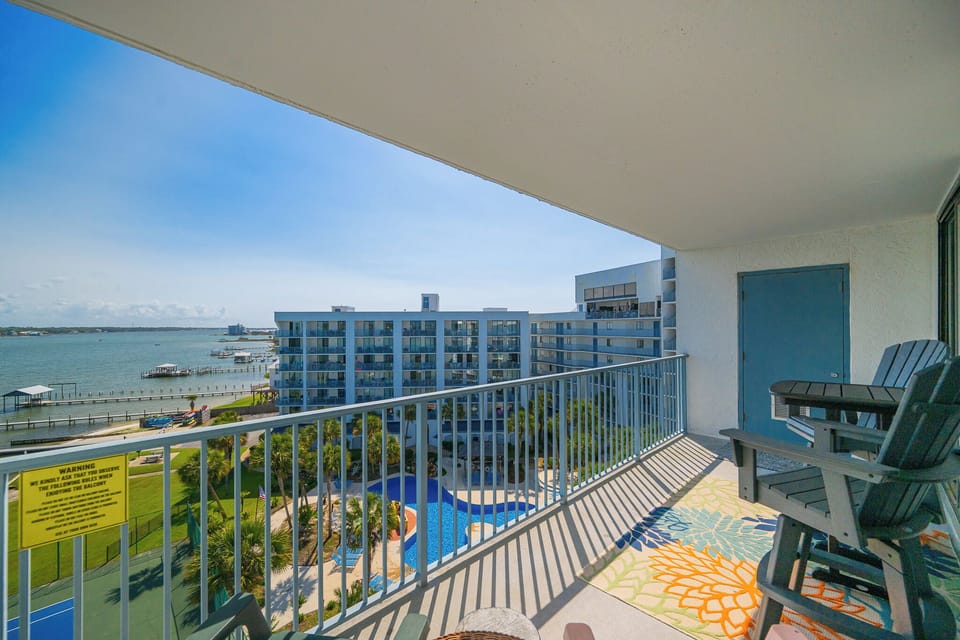 Relax on your balcony, sipping drinks while enjoying scenic views of the lagoon and resort pool below