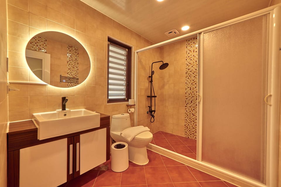 Shower, rainfall showerhead, designer toiletries, hair dryer