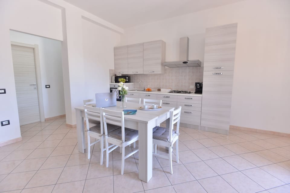 Apartment | Private kitchen | Full-size fridge, microwave, oven, espresso maker