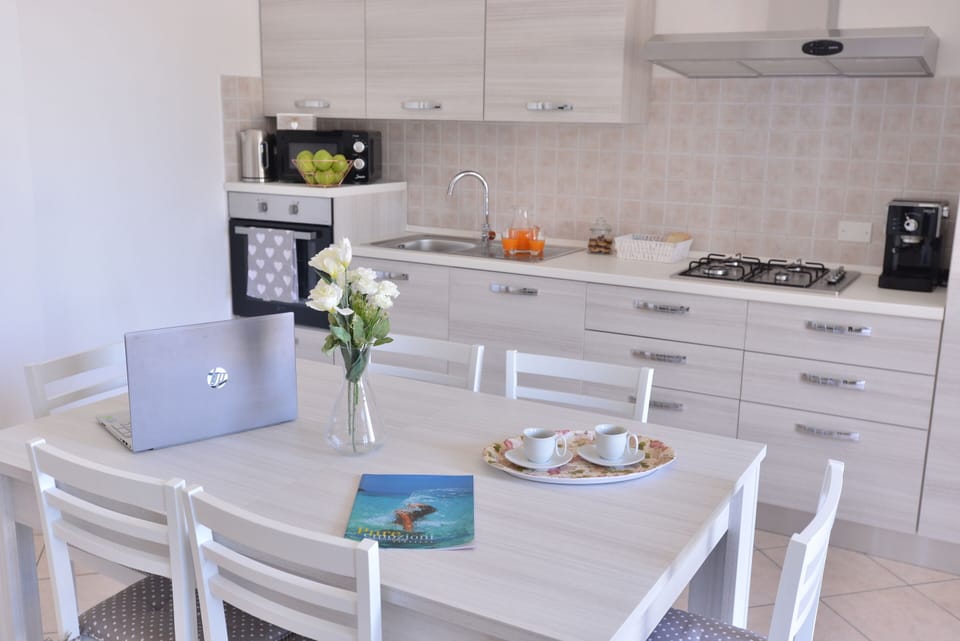 Full-size fridge, microwave, oven, espresso maker