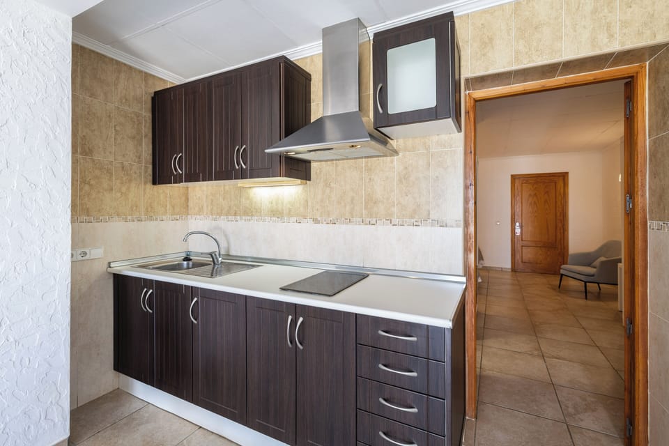 Family Apartment, 1 Bedroom, Pool Access, Sea View | Living area | 30-inch flat-screen TV with satellite channels, TV