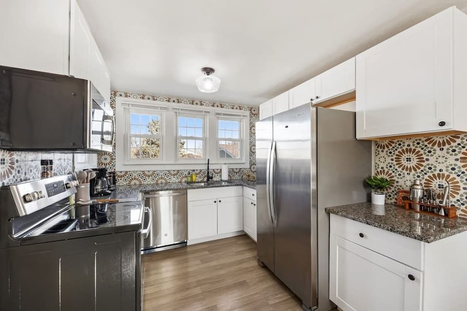 Kitchen—Includes cocktail kit as well as a variety of glasses